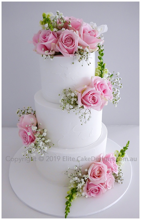 Rustic wedding cake with pink roses in Hunter Valley